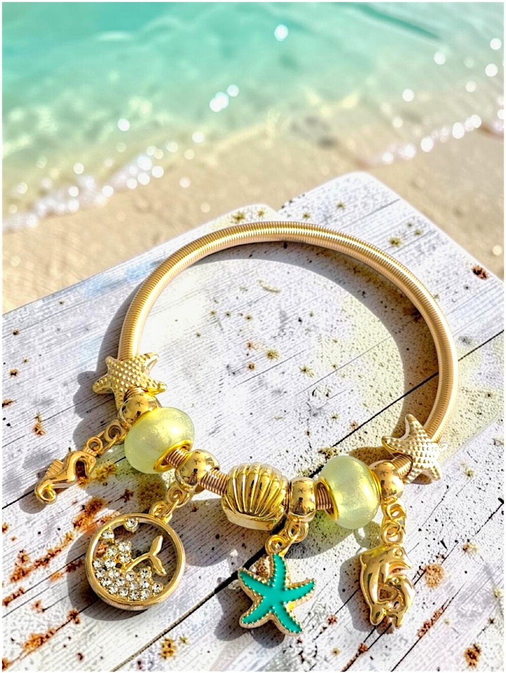 Gold Sea Life Charm Bracelet with Turquoise Green Starfish